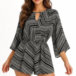 Very cute black and white Shorts Romper.